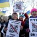 ​“Единая Россия” на плакатах антивакцинаторів в QR-кодах