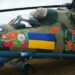 Майстри з Петриківки розмалювали військовий гелікоптер і спорядження для бійців ЗСУ
