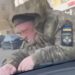 У Дніпрі військовий опинився на капоті Tesla: у ТЦК розповіли, що сталося